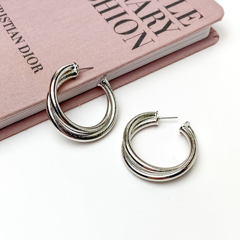 Twisted Hoop Earrings in Textured Silver Tone