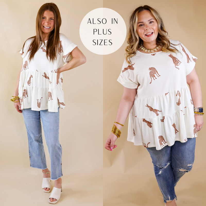 Model is wearing a tiered babydoll top with cheetahs printed all over. Size small model has this top paired with light wash jeans, ivory heels, and gold jewelry. Size large model has it paired with distressed jeans and gold jewelry.