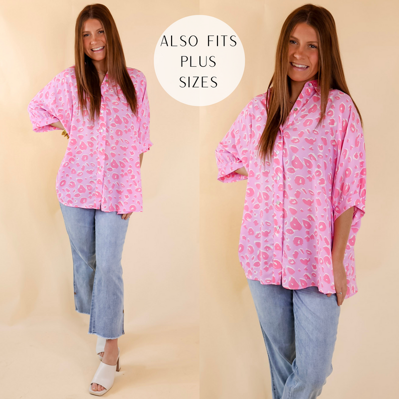 A light pink button up top with darker pink leopard spots, flowy half sleeves, a collar, and an oversized fit. Item is pictured on a pale pink background