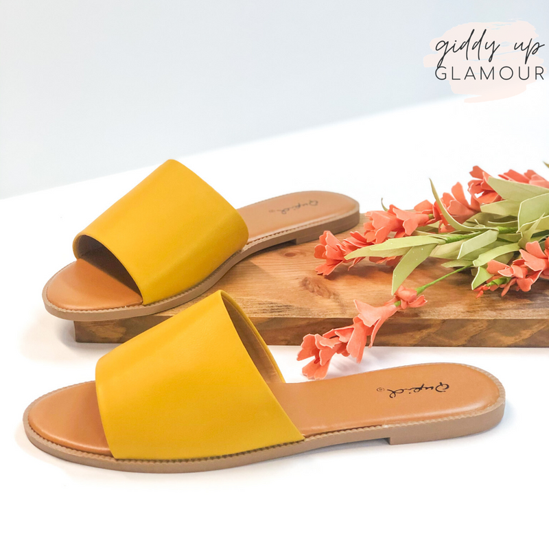 yellow slip on sandals