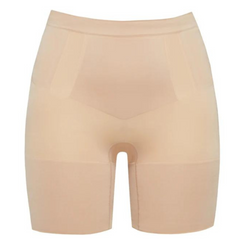 A pair of nude color shorts that are mid thigh length. These shorts are pictured on a white background.