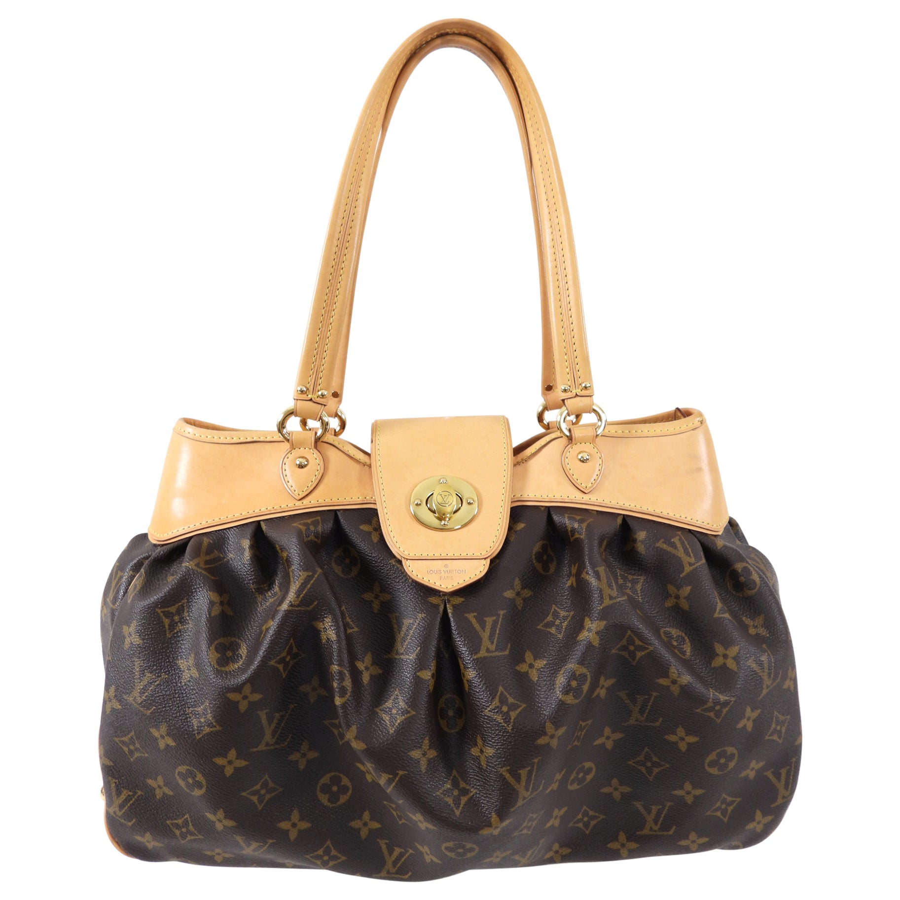 Discover Timeless Elegance: Louis Vuitton Artsy mm at Dress Raleigh