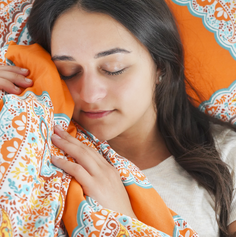 girl sleeping in bed