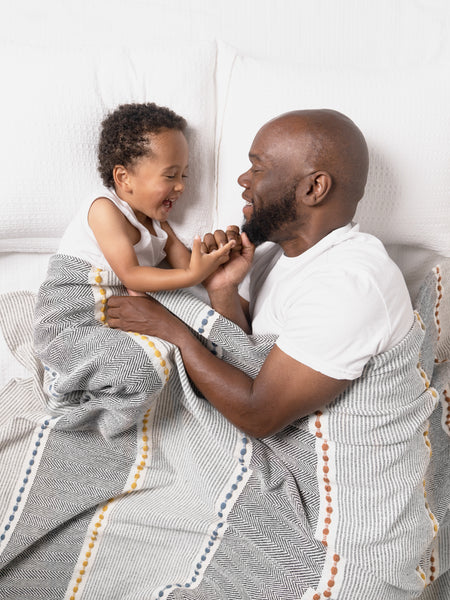 Father and son with Herringbone Stripe Blanket