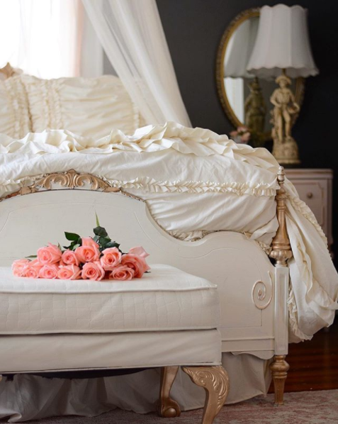 Golden touches in a French Country Bedroom. Photo by Larissa Jenkins