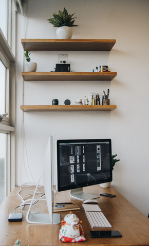 Floating shelving in office