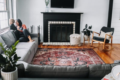 fireplace with flat screen tv above