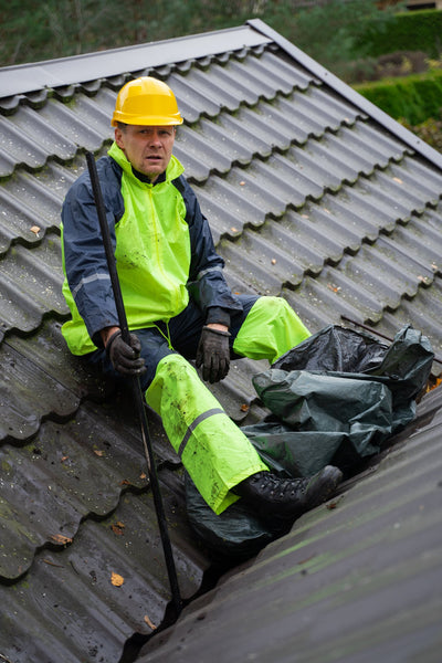 man working on a roof