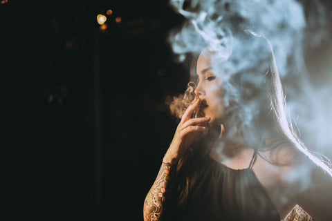 Asian Girl Smoking Rolling Papers 