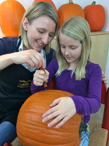 Mother and daughter carving