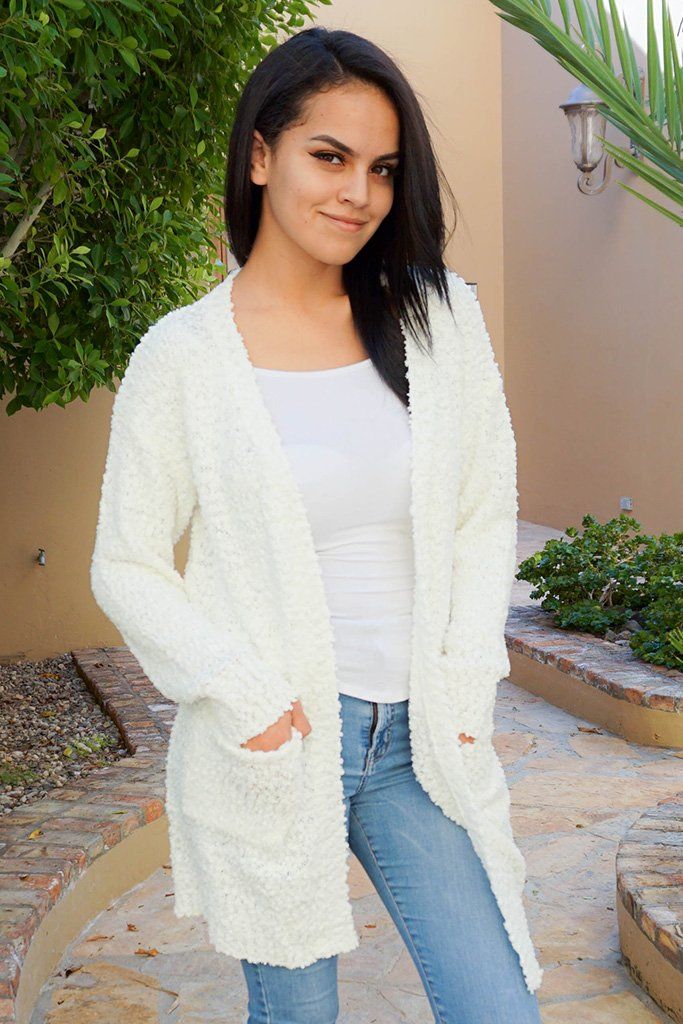 white cardigan sweater