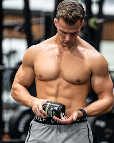 Bodybuilder with supplements