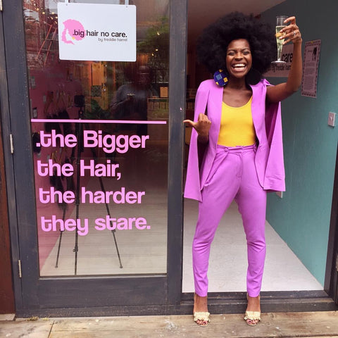 Freddie Harrel outside her shop Big Hair no Care