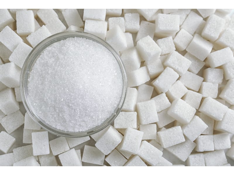 Bowl of sugar and sugar cubes