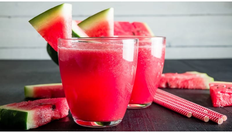 2 glasses of watermelon themed drinks