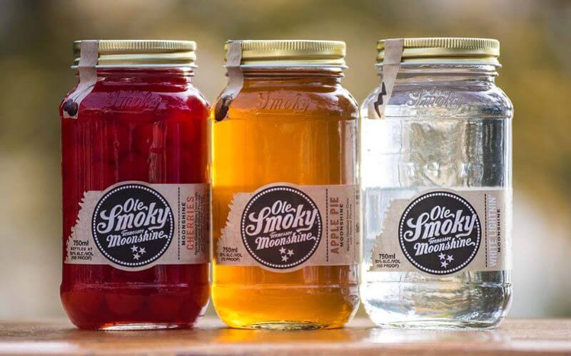 3 jars of Moonshine flavors - Image by Ole Smoky