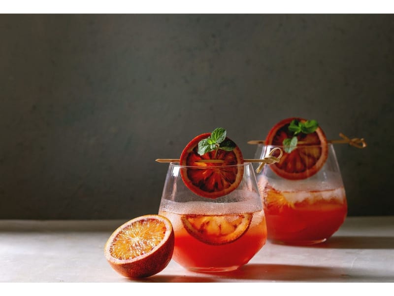 Two glasses of sparkling blood orange mocktail