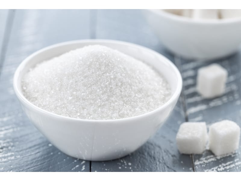  Bowl of sugar with sugar cubes