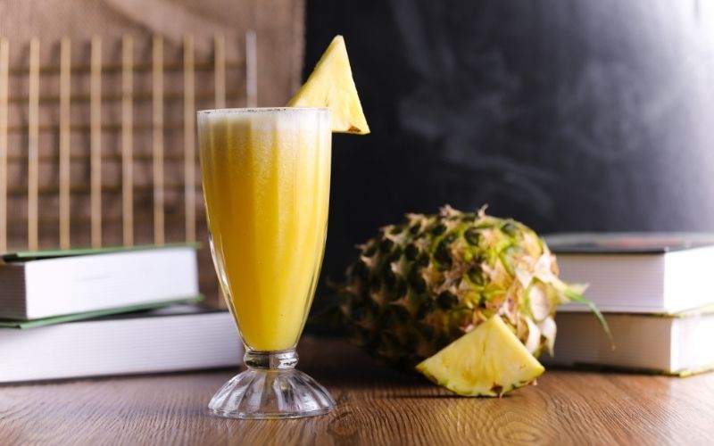 Juicy IPA Pineapple Slushie with pineapple garnish