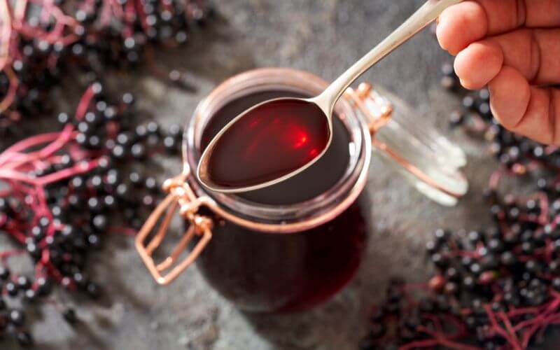 Fruit syrup on a spoon