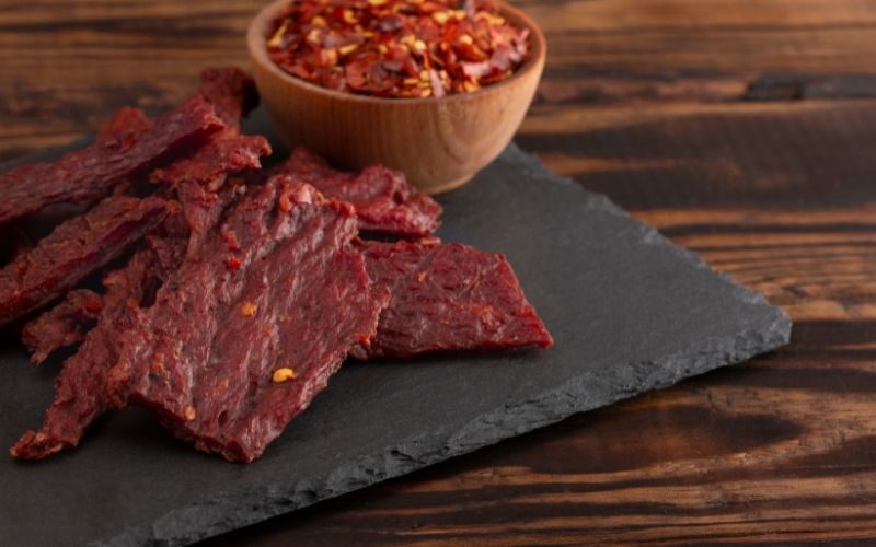 A Pile of Hot and Spicy Beef Jerky with Red Pepper Flakes