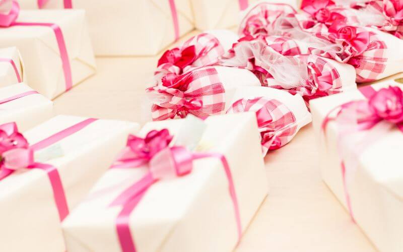 A bunch of pink gift boxes and pouches