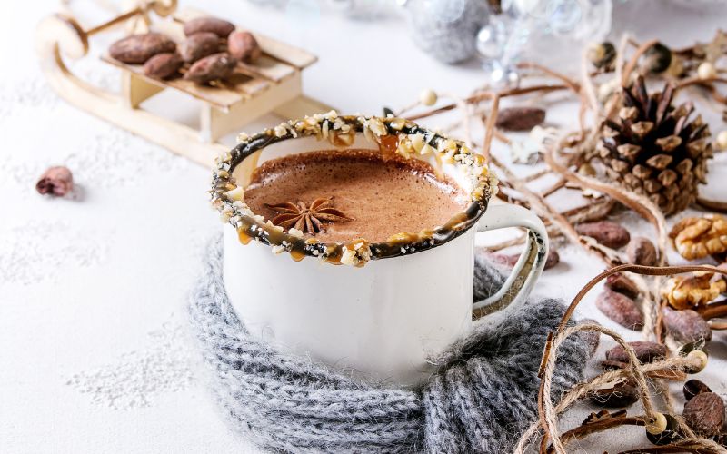 A cup of Mexicocoa in a festive white background