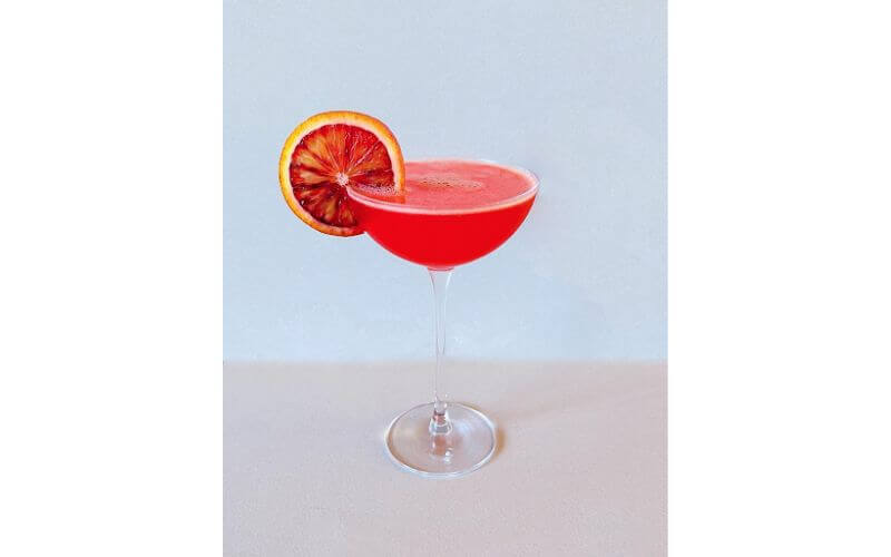 A glass of Blood Orange Gin Fizz