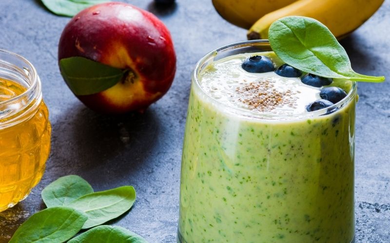 A glass of Blueberry And Spinach Smoothie