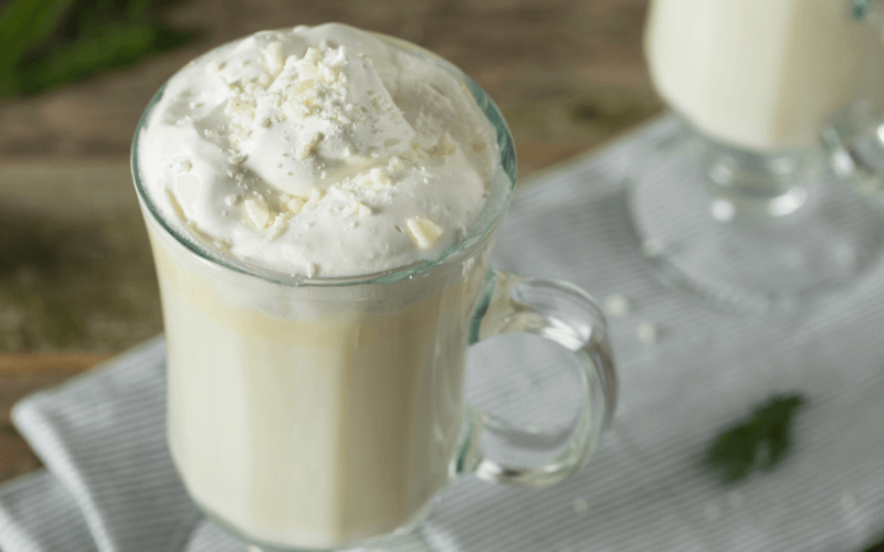 A glass of Boozy White Hot Chocolate