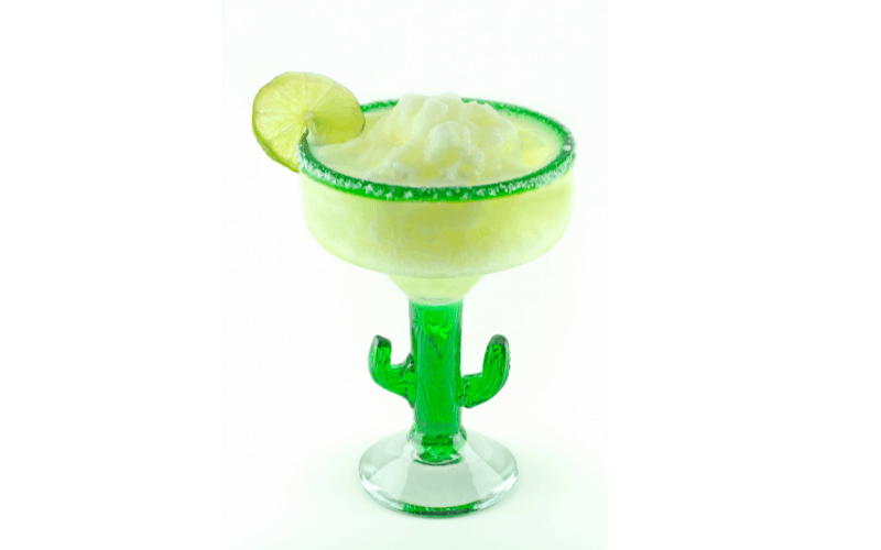 A glass of Frozen Apple Margarita