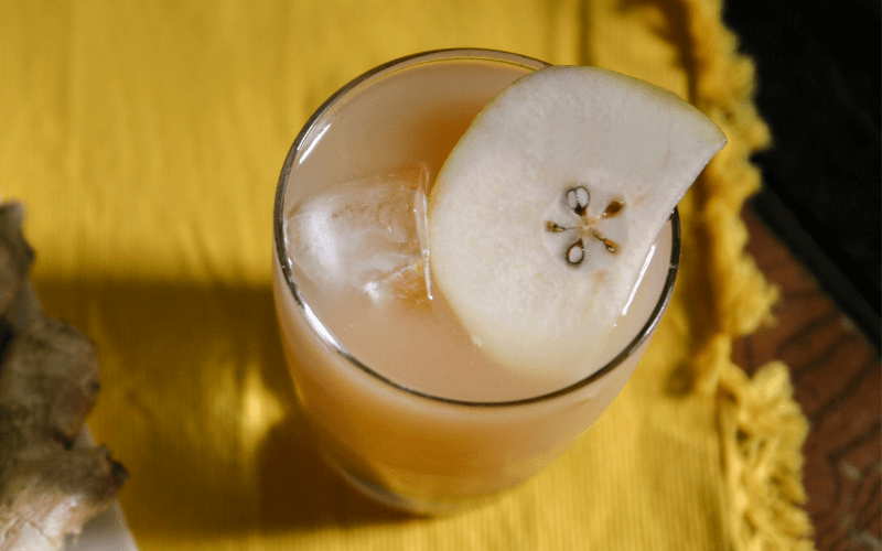 A glass of Ginger Pear Bourbon cocktail