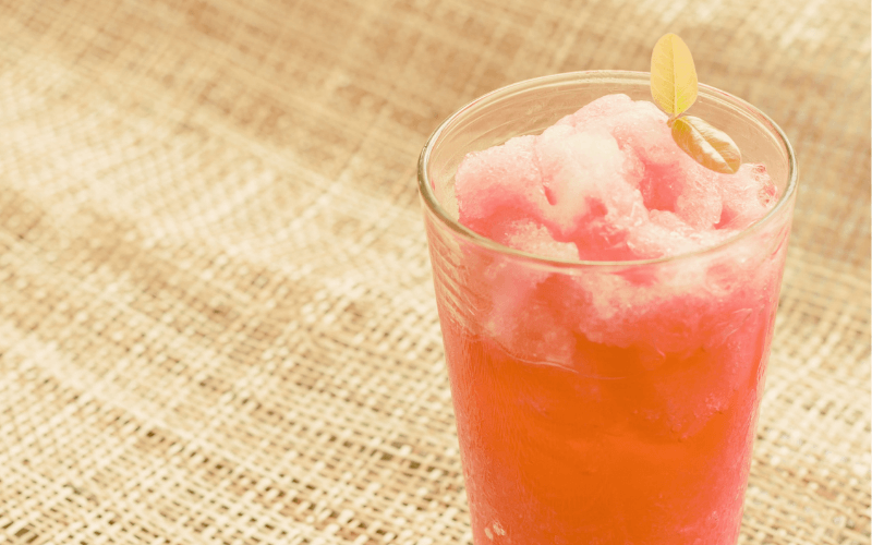 A glass of Pomegranate Grapefruit Frosé