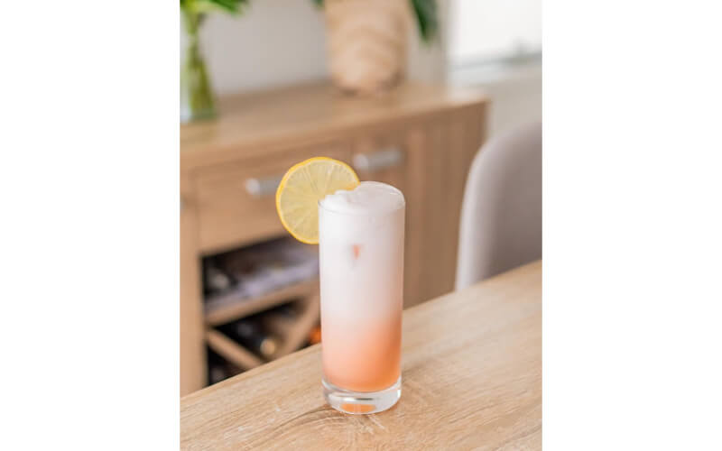 A glass of Slow Gin Fizz