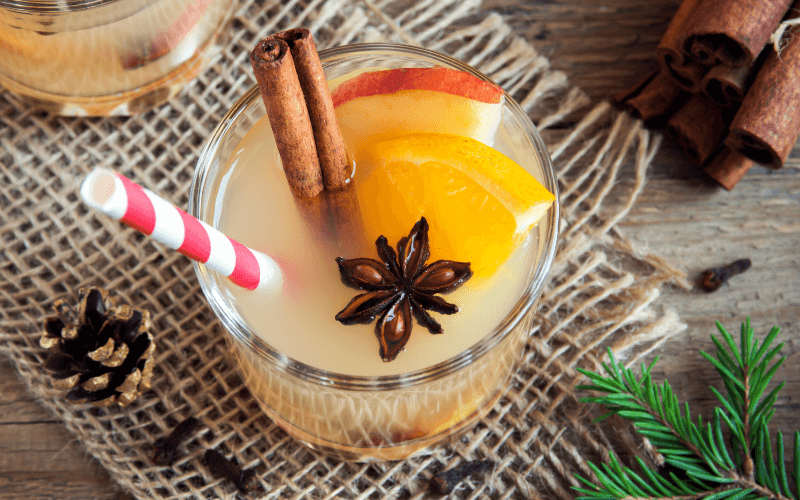 A glass of Spiced Orange Apple Amaretto Punch