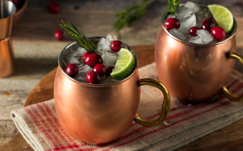 Alcoholic Festive Moscow Mules in Copper Mugs
