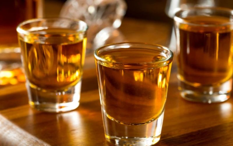 Apple pie bourbon in shot glasses