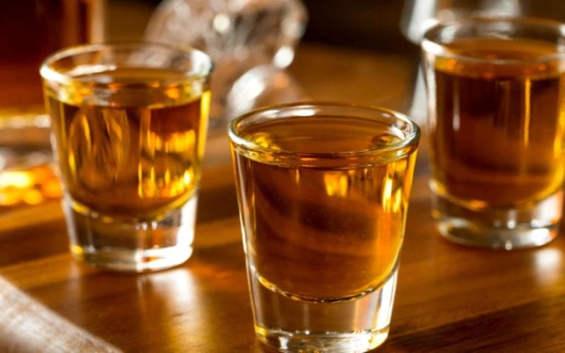 Apple pie bourbon in shot glasses