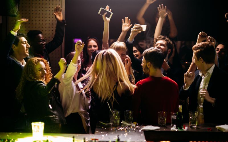 Bar patrons cheering