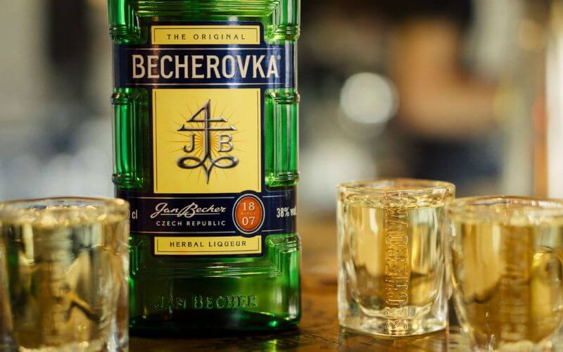 Becherovka bottle and shot glasses