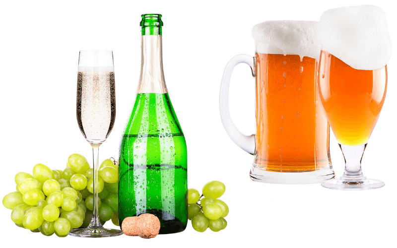Bottle and glass of Champagne with grapes beside a mug and glass of beer