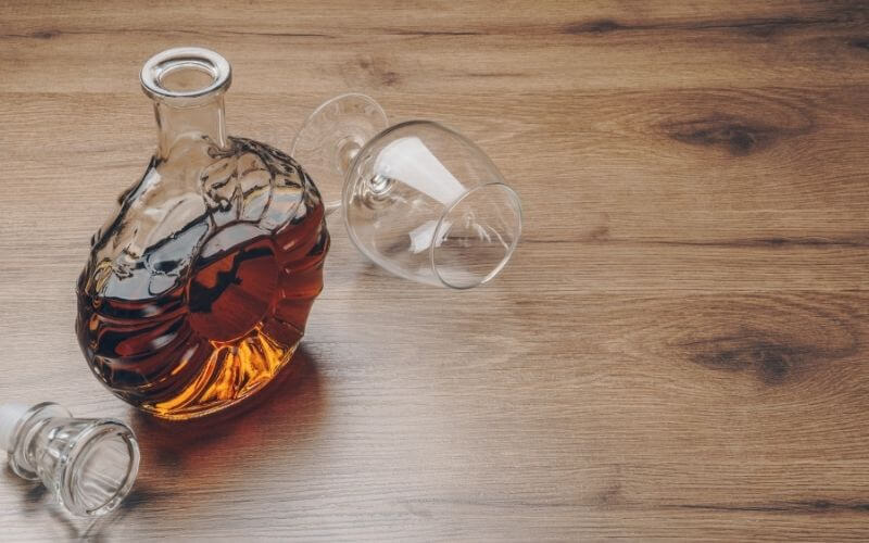 Brandy decanter beside brandy glass