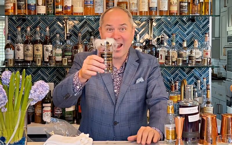 Brian Van Flandern holding a dry ice cocktail