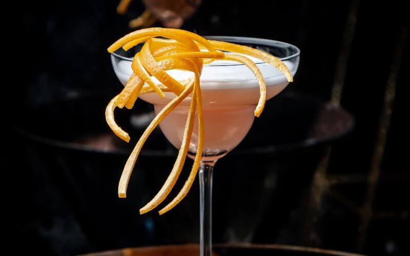Cocktail drink with a creative citrus garnish