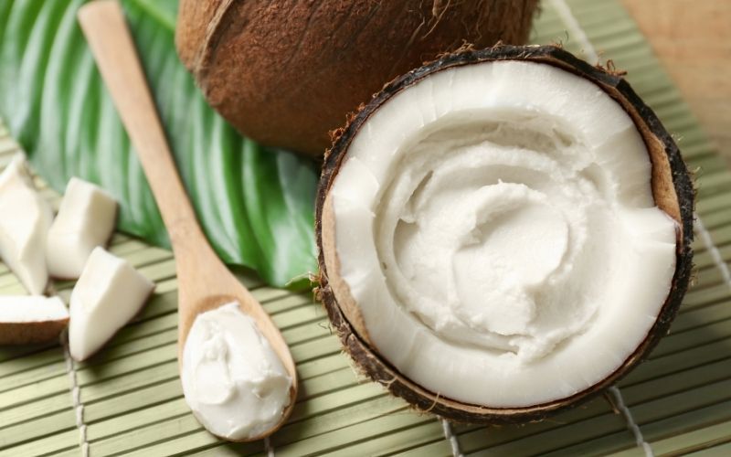 Coconut Cream in a Coconut on a Bamboo Mat