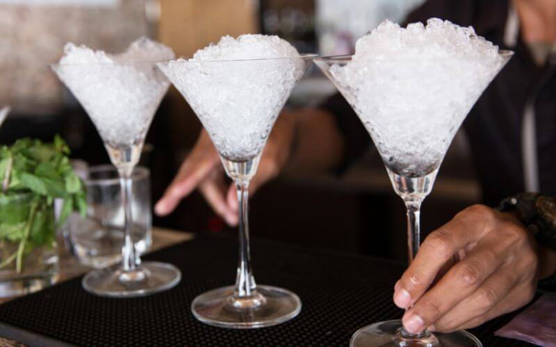 Crushed ice in martini glasses