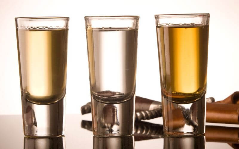 Different tequilas in shot glasses