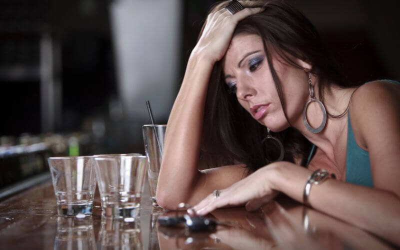 Drunk Woman in a Bar