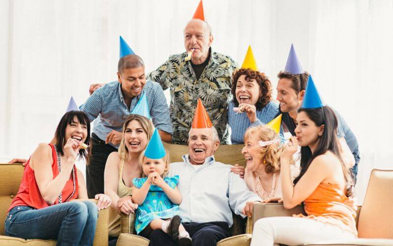 Family celebrating the grandfather's birthday 