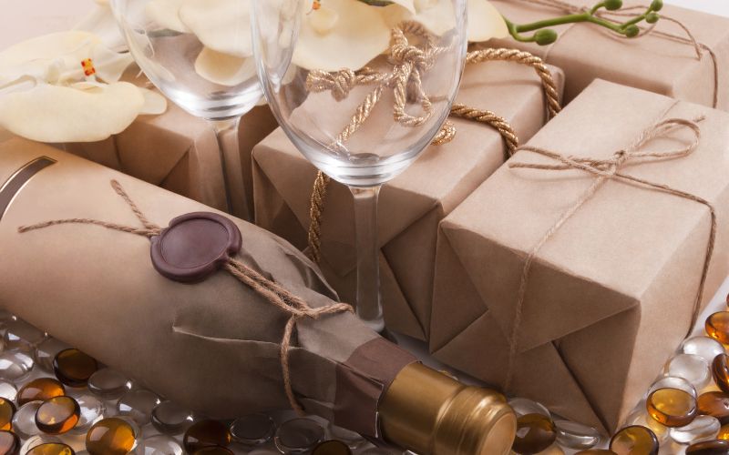 Gifts, wine bottle, and glass